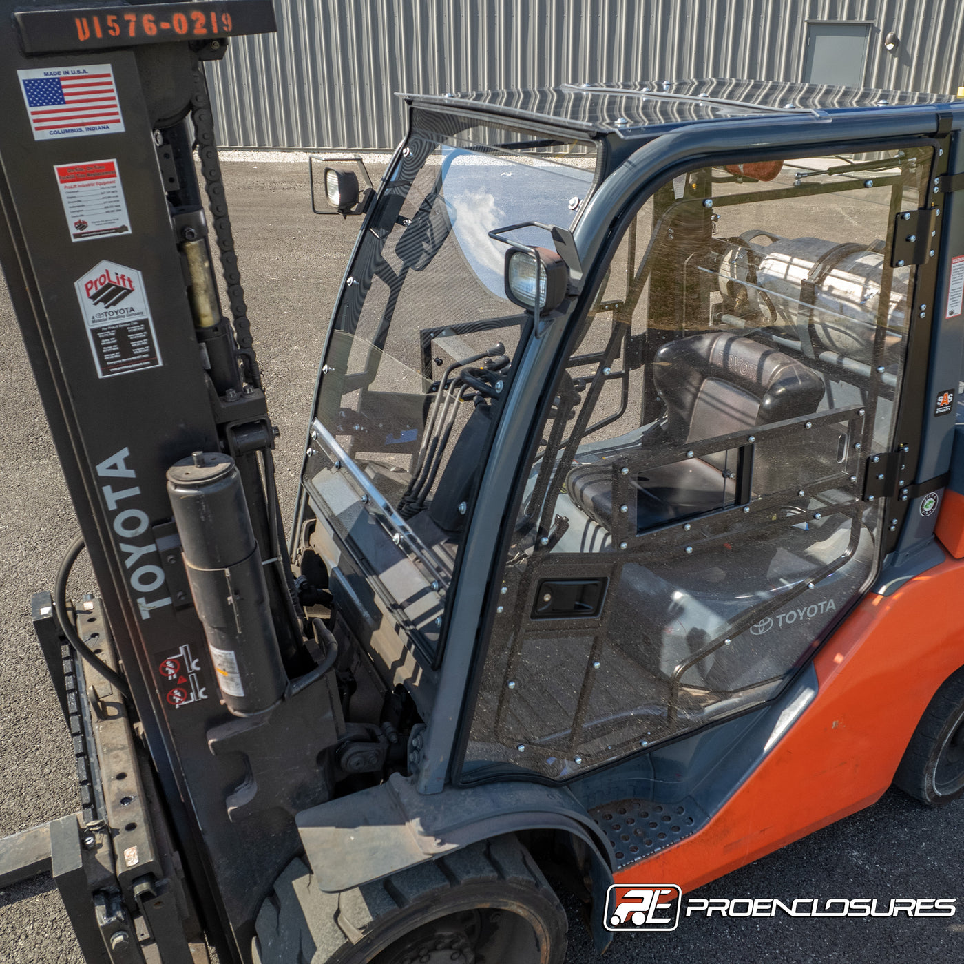 toyota forklift with cab enclosure outside